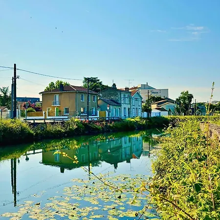 Casa de Férias La Maison Du Quai - Face à La Sèvre Niortaise
